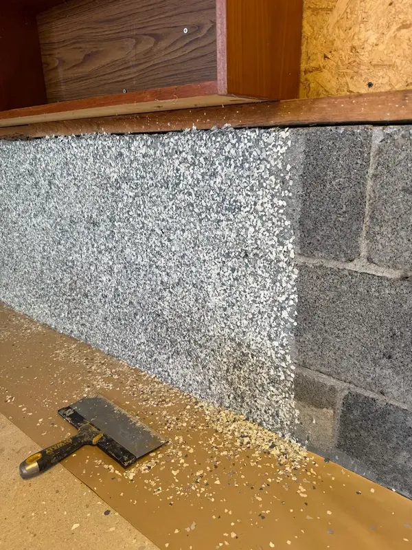 Tidal Wave flake finish carried up the lower block wall of an Annandale garage