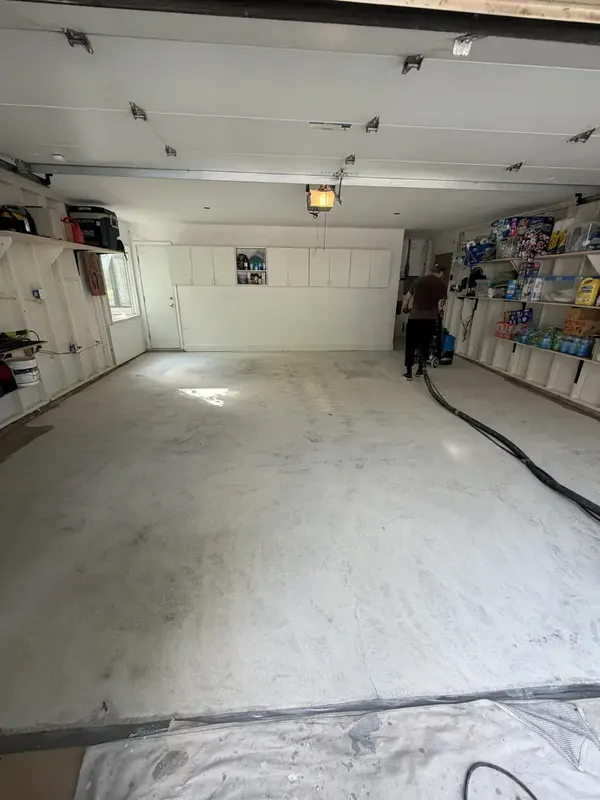 Ground concrete in the Potomac garage during surface preparation, before coating